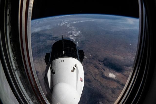 NASA image: The SpaceX Dragon Freedom spacecraft is pictured docked to the forward-facing port of the Harmony module