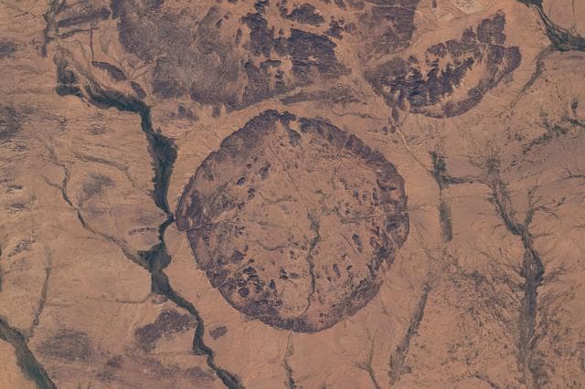 NASA image: Ancient settlements surround this circular, geological feature in Mali