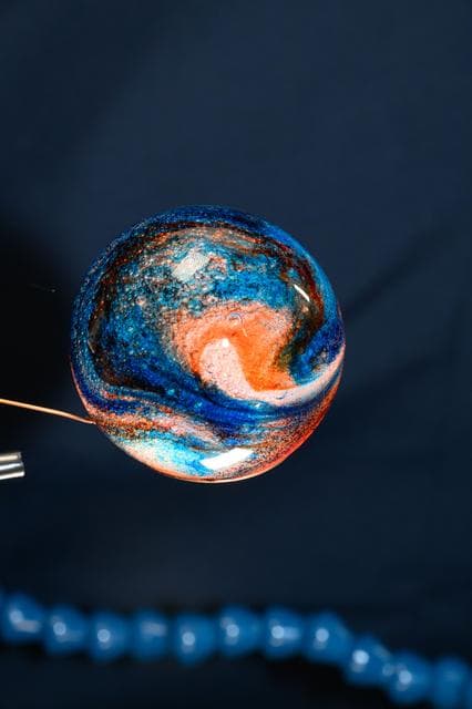 NASA image: Sphere of water filled with food coloring in microgravity