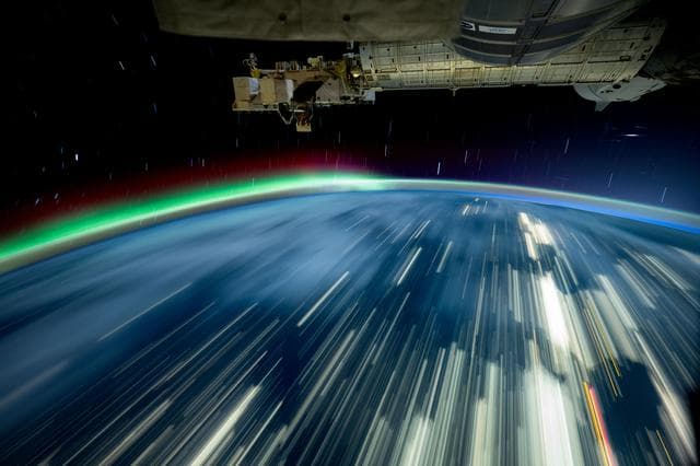 NASA image: A long-exposure shot as the International Space Station soared 257 miles above Lake Michigan