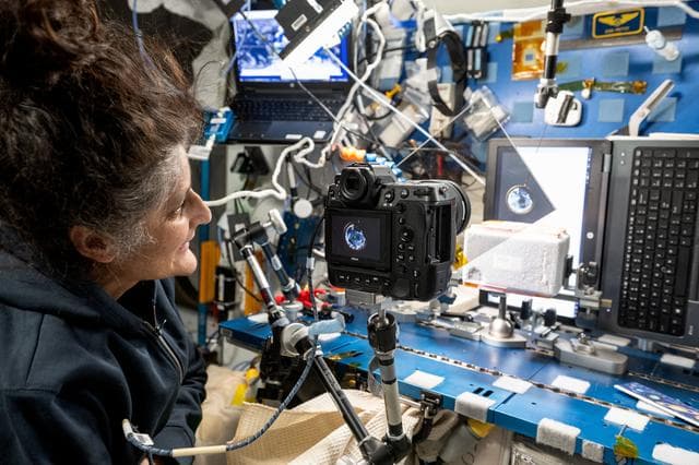 NASA image: Astronaut photographs ice crystals forming inside a sheet of water