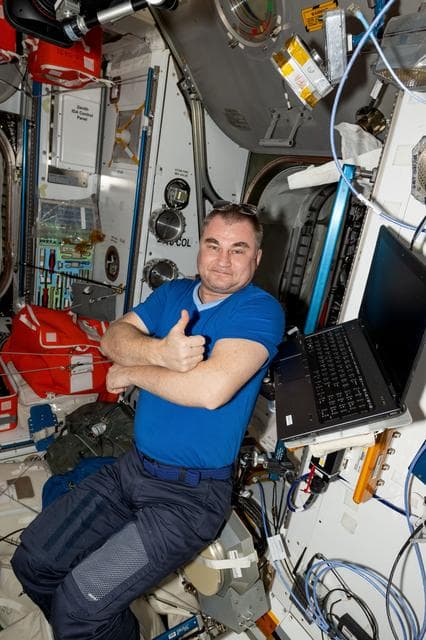 NASA image: Roscosmos cosmonaut Alexey Ovchinin gives a thumbs up