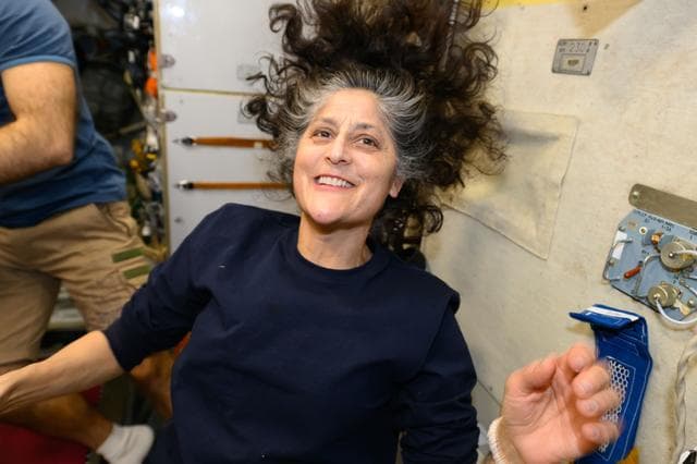 NASA image: Astronaut Suni Williams smiles for a portrait inside the International Space Station