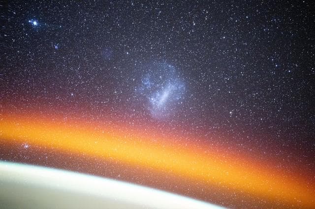 NASA image: The Large Magellanic Cloud above Earth's atmospheric glow