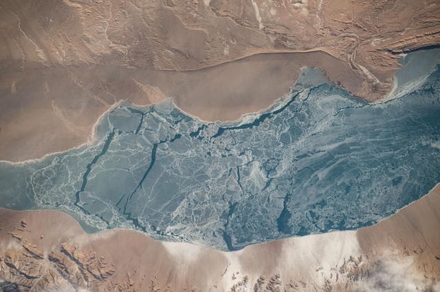 NASA image: An icy lake in southwestern China's high plateau region
