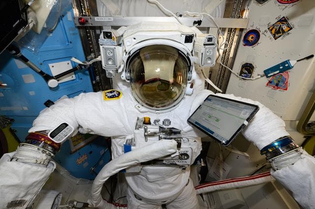 NASA image: A U.S. spacesuit is pictured being serviced for maintenance