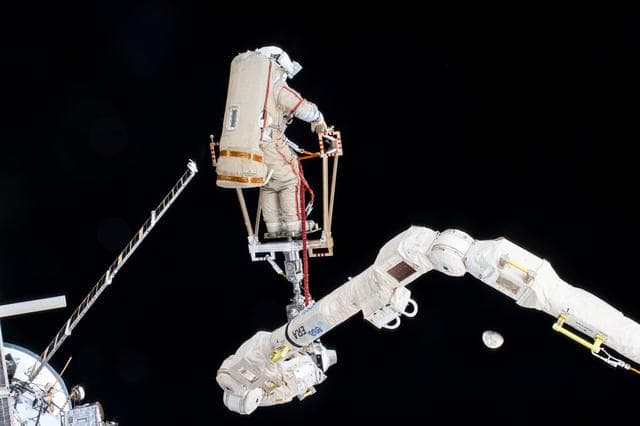 NASA image: Roscosmos cosmonaut Alexey Ovchinin rides the European robotic arm