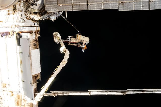 NASA image: Roscosmos cosmonaut Alexey Ovchinin rides the European robotic arm