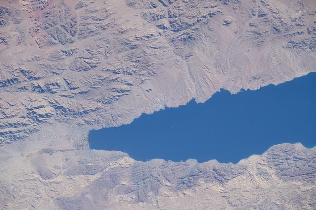 NASA image: The northern tip of the Gulf of Aqaba is surrounded by the borders of four Middle East nations