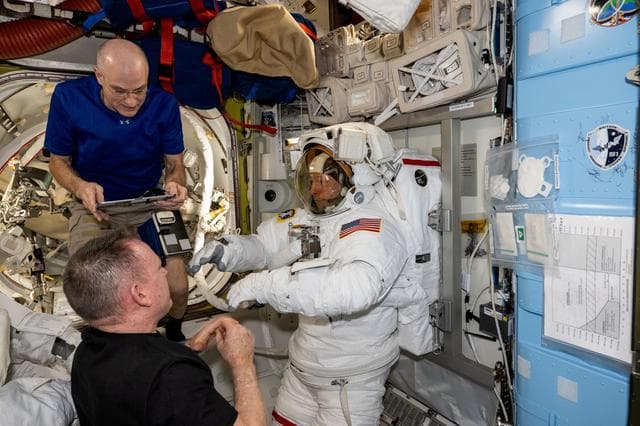 NASA image: NASA astronauts evaluate a spacesuit