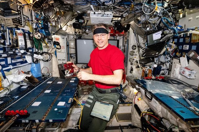 NASA image: Astronaut Nick Hague processes samples of micro-algae in the Harmony module