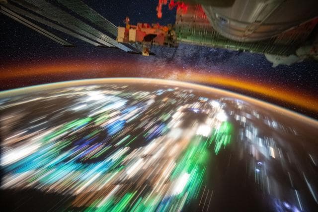NASA image: The city lights of Southeast Asia underneath Earth's atmospheric glow