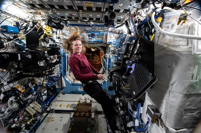 NASA image: Astronaut Nichole Ayers is pictured at the controls of the robotics workstation