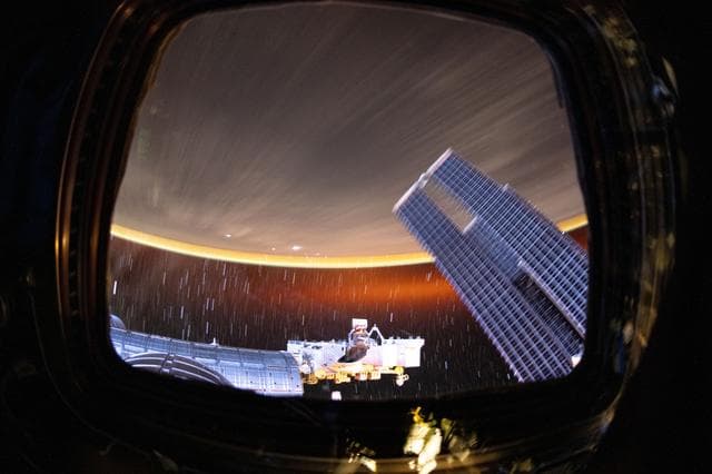 NASA image: Earth's atmopsheric glow underneath star trails