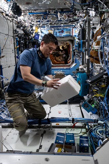 Astronaut Jonny Kim installs experimental hydrogen sensors
