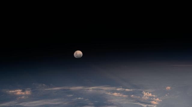 NASA image: The Moon's light is refracted by the Earth's atmosphere