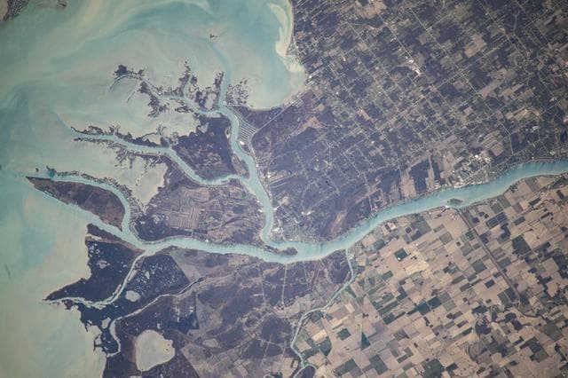 NASA image: The St. Clair River flows into the freshwater Lake St. Clair