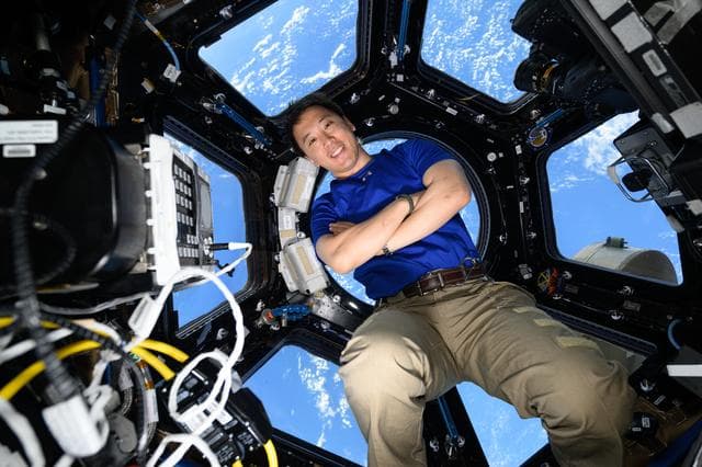 NASA image: NASA astronaut Jonny Kim poses for a portrait inside the International Space Station's "window to the world"