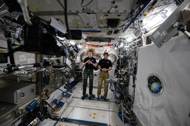 NASA image: Astronauts Nichole Ayers and Takuya Onishi talk to students from New York