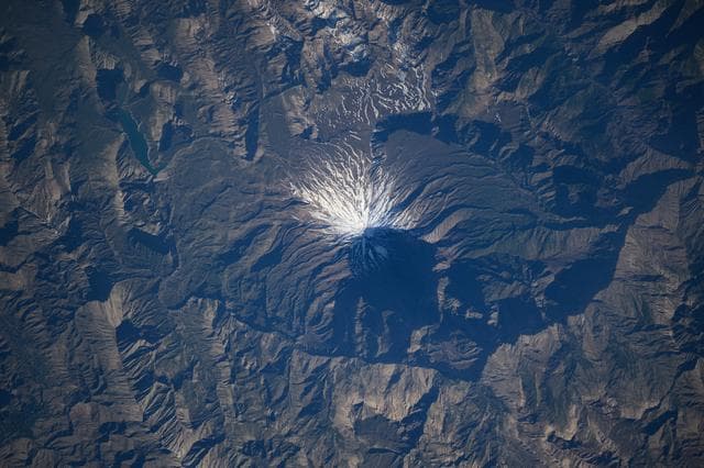 NASA image: The snow-capped Mount Damavand, a dormant stratovolcano and Iran's highest peak