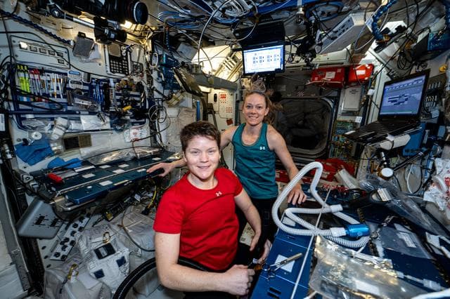 NASA image: NASA astronauts Anne McClain and Nichole Ayers pose for a portrait together