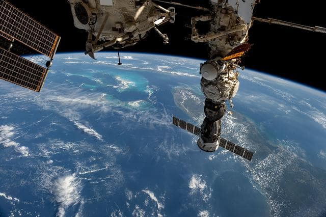 NASA image: The Soyuz MS-27 spacecraft  docked to the Prichal module above Florida