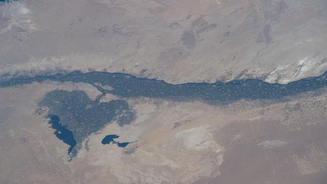 NASA image: The leaf-shaped Faiyum Oasis fed by a channel of the River Nile