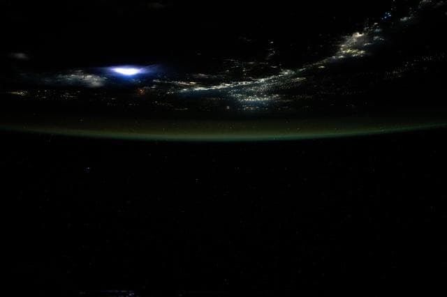 NASA image: Lightning illuminates the clouds above Southeast Asia