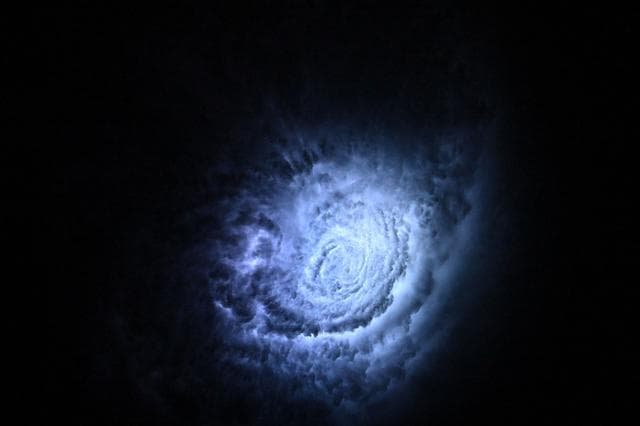 NASA image: Lightning illuminates the cloud tops of Tropical Storm Erick