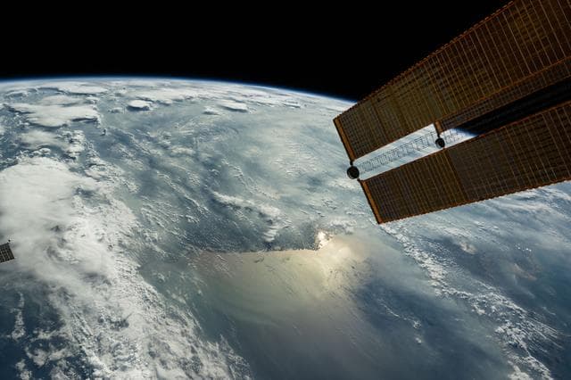 NASA image: The sun's glint beams off the Yellow Sea coast of Jiangsu Province, China
