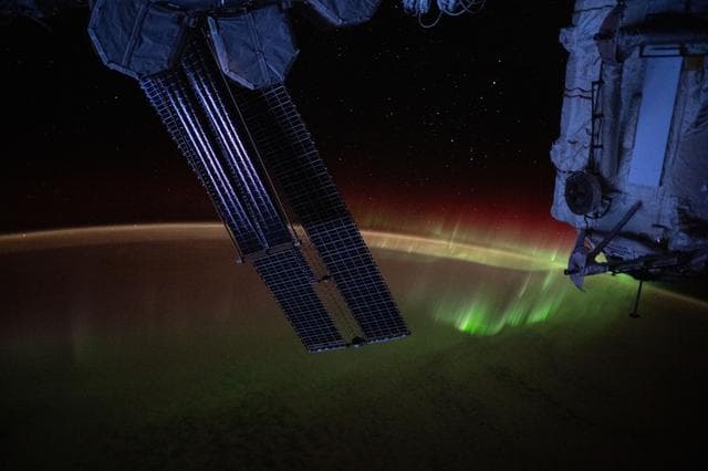 NASA image: A wispy aurora spikes across the Indian Ocean