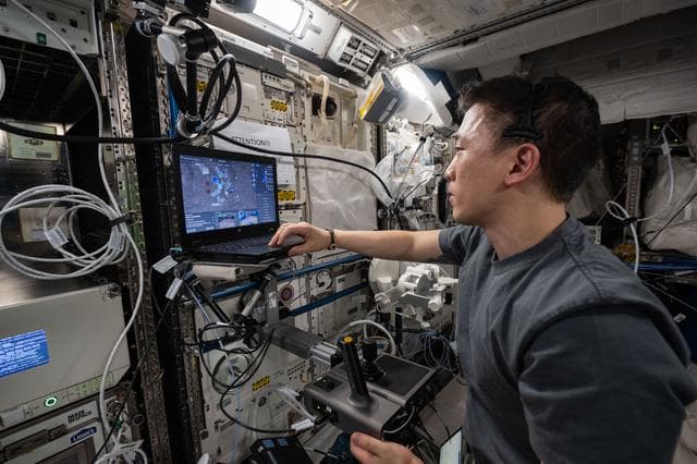 NASA image: NASA astronaut Jonny Kim tests space-to-ground robotic controlling methods