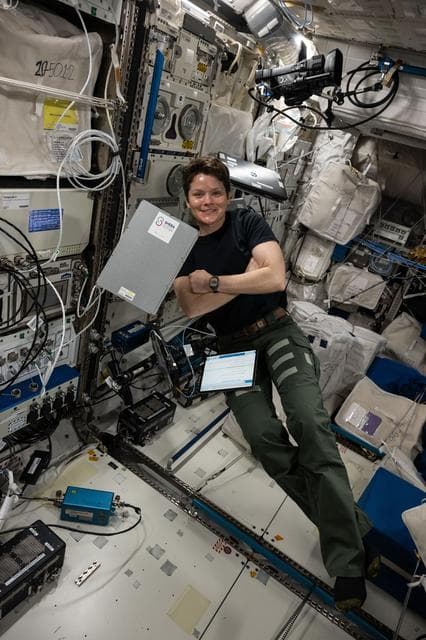 NASA image:  NASA astronaut Anne McClain smiles for a portrait during scientific operations