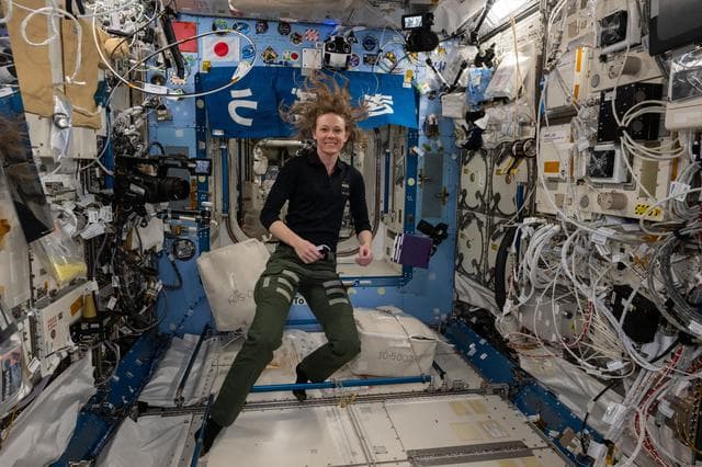 NASA image: NASA astronaut Nichole Ayers smiles for a portrait during scientific operations