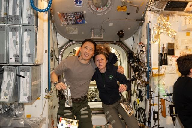 NASA image: NASA astronauts Jonny Kim and Zena Cardman pose for a portrait in the Unity module