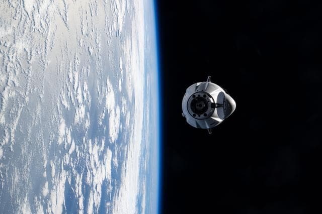 NASA image: A SpaceX Dragon cargo spacecraft approaches the International Space Station