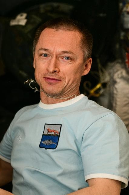 NASA image: Expedition 73 Commander Sergey Ryzhikov pictured during electronics maintenance