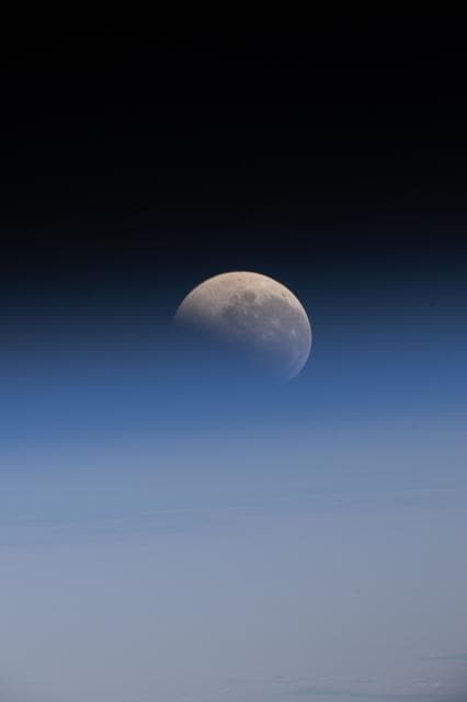 NASA image: The lunar eclipse, also known as the Blood Moon, above Earth's horizon