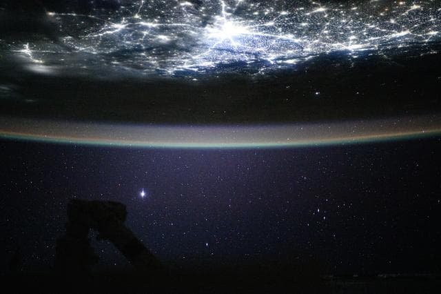 NASA image: The city lights of New Delhi, India, underneath a starry night sky