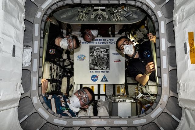 NASA image: Expedition 73 astronauts pictured inside the Cygnus XL cargo craft