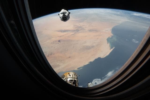 NASA image: A SpaceX Dragon cargo spacecraft approaches the International Space Station