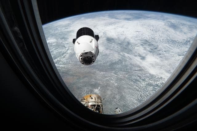 NASA image: A SpaceX Dragon cargo spacecraft approaches the International Space Station
