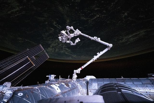 NASA image: The International Space Station's U.S. segment gleams during an orbital sunset