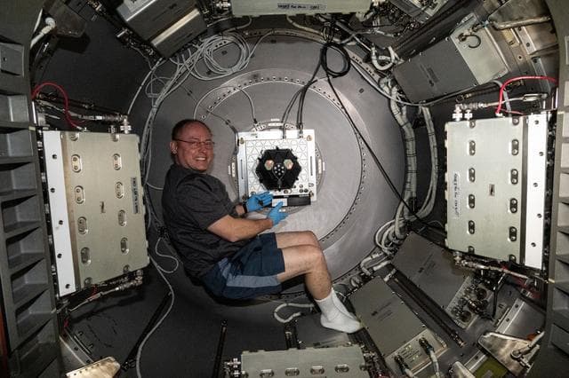 NASA image: NASA astronaut Mike Fincke shows off the Voyager Flytrap technology demonstration