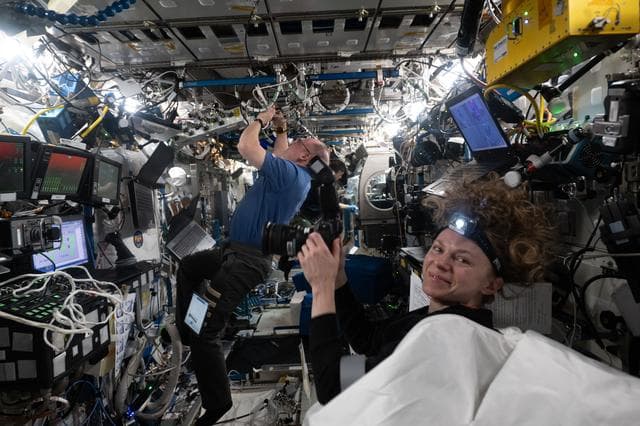 NASA image: NASA astronaut Zena Cardman photographs NASA astronauts Mike Fincke and Jonny Kim