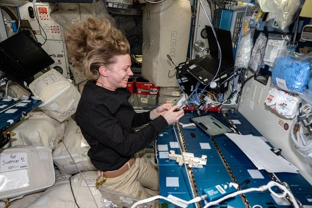 NASA image: NASA astronaut Zena Cardman performs maintenance on the Multi-use Variable-g Platform-02 
