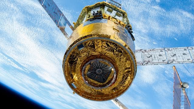 NASA image: The new HTV-X1 in the grips of the Canadarm2