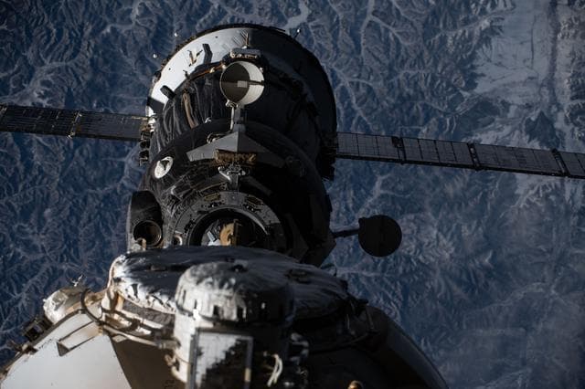 NASA image: The Soyuz MS-27 spacecraft backs ways from the International Space Station