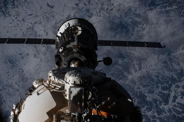 NASA image: The Soyuz MS-27 spacecraft backs ways from the International Space Station