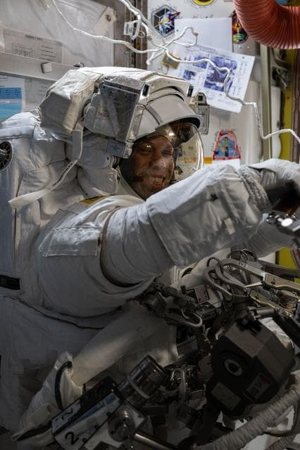 NASA image: NASA astronaut Chris Williams smiles for the camera during a spacesuit fit verification